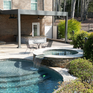 Residential outdoor area with pool, jacuzzi and pergola